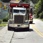 A 2023 file photo of a heavy truck driving on the sidewalk along East Brockway Avenue.